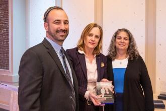 Queens District Attorney Melinda Katz, poses for a photo with Jason Goldberg and UFT Educational Liaison Laurie Lubman at the 2024 UFT Jewish Heritage Committee Tikkun Olam Awards Dinner on Dec. 5, 2024. 